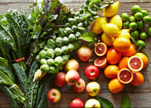 a group of fruits and vegetables on a wood surface Healthy Weight Loss Diets Preston